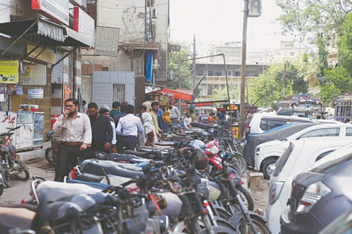 KMC takes action against illegal parking charges, plot allotments